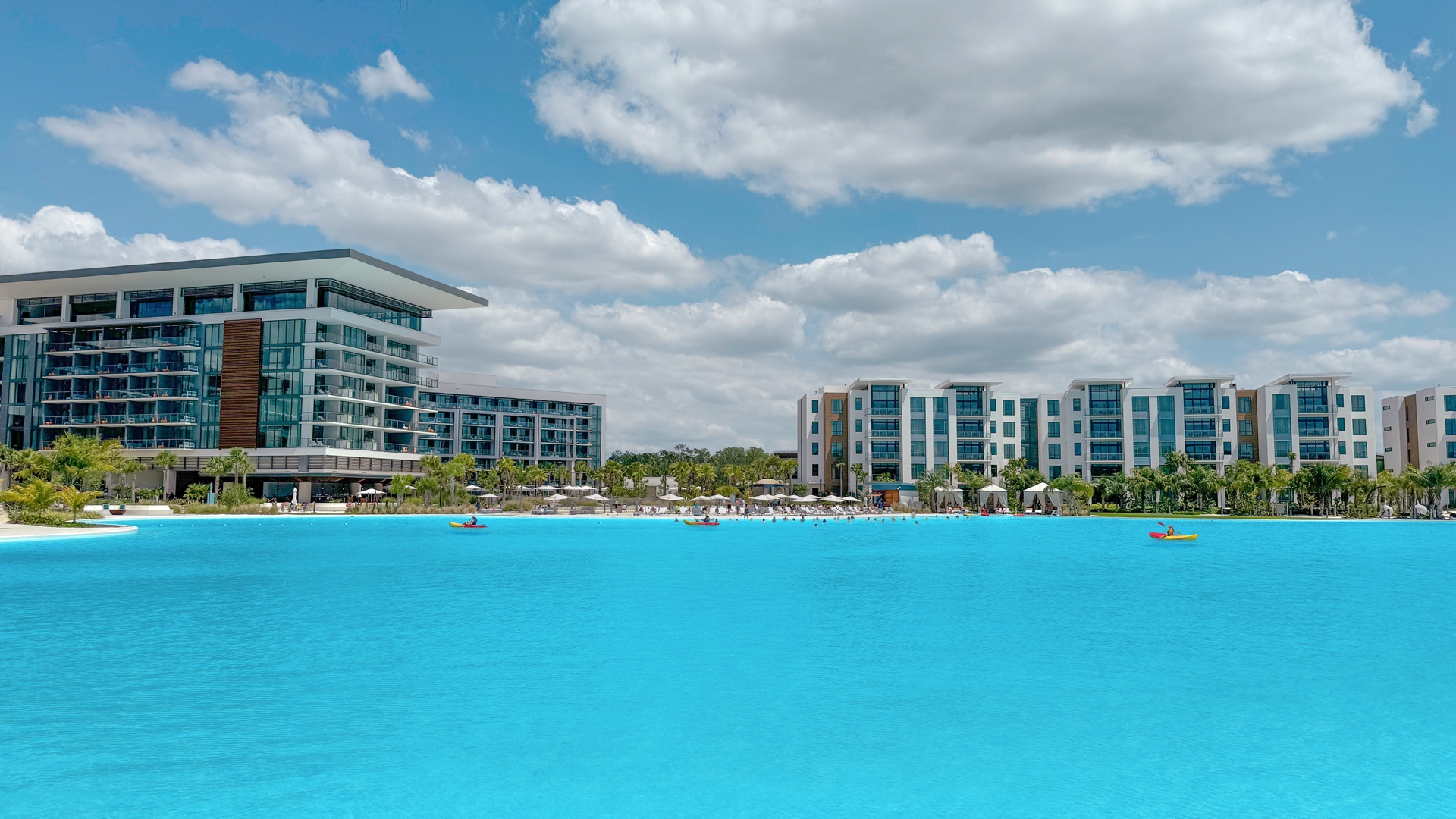 Kayakers on the turquoise lagoon at Evermore Orlando Resort, Crystal Lagoons amenity in Florida